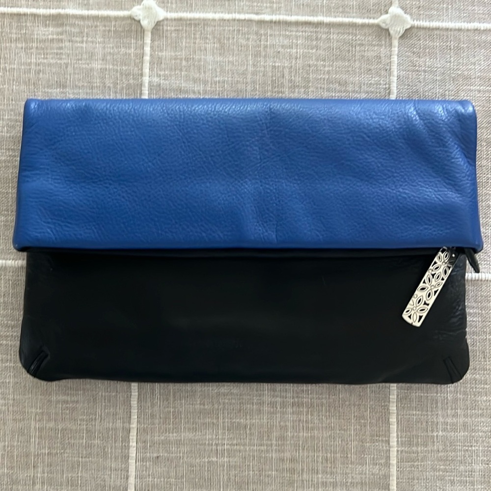 Brighton, genuine, fold over black and blue very soft leather clutch handbag.
